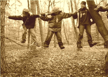 boys balancing together on a rope - copyright by MOBI Germany